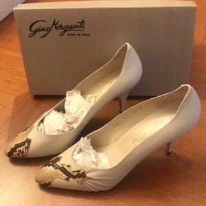 Bone leather and snakeskin. Made in Spain.